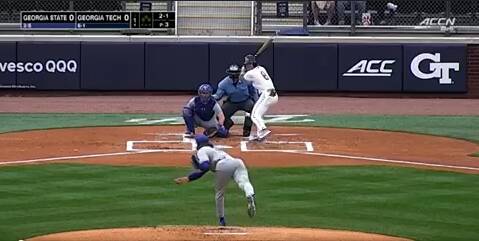 A baseball match in a stadium